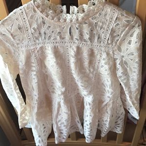 Intricate woven cream lace patterns